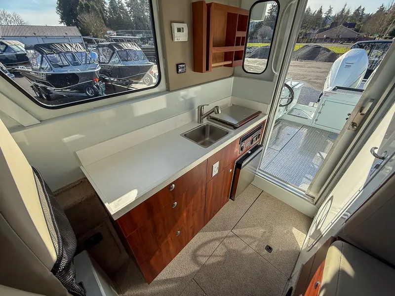 Slide: The Image of Hewescraft 270 Pacific Explorer 2026 - 11