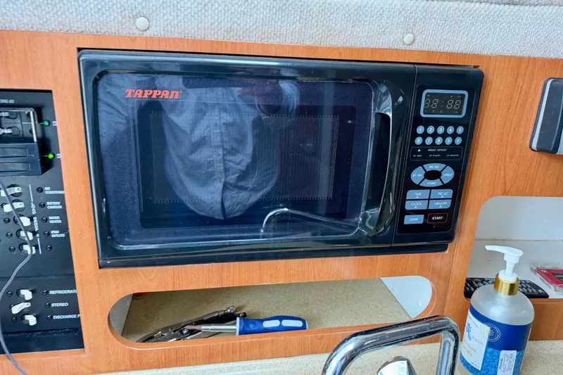 Slide: The Image of Tappan microwave in 2006 Seaswirl Striper 2901 Walkaround O/B boat kitchen area. - 15