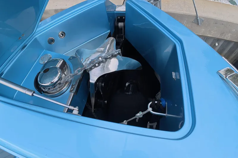 Slide: The Image of Anchor compartment of 2025 Schaefer V44 boat with chain and winch. - 39
