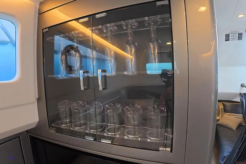 Slide: The Image of Glass cabinet with wine glasses inside Schaefer V44 yacht, 2025 model. - 47