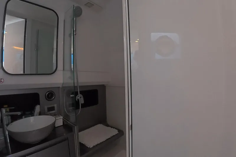 Slide: The Image of Modern bathroom interior of 2025 Schaefer V44 yacht with sleek design elements. - 49