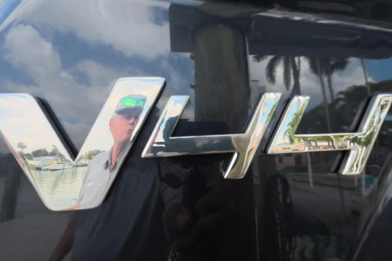 Slide: The Image of 2025 Schaefer V44 logo with reflection of marina and palm trees. - 53