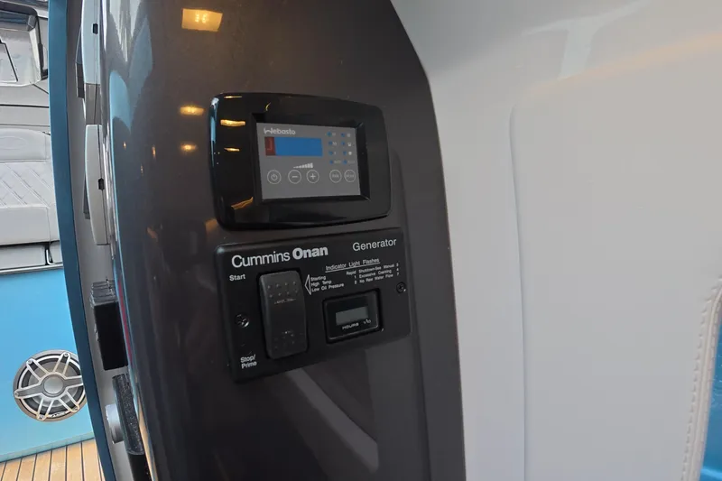 Slide: The Image of Control panel of Cummins Onan generator on 2025 Schaefer V44 yacht. - 6