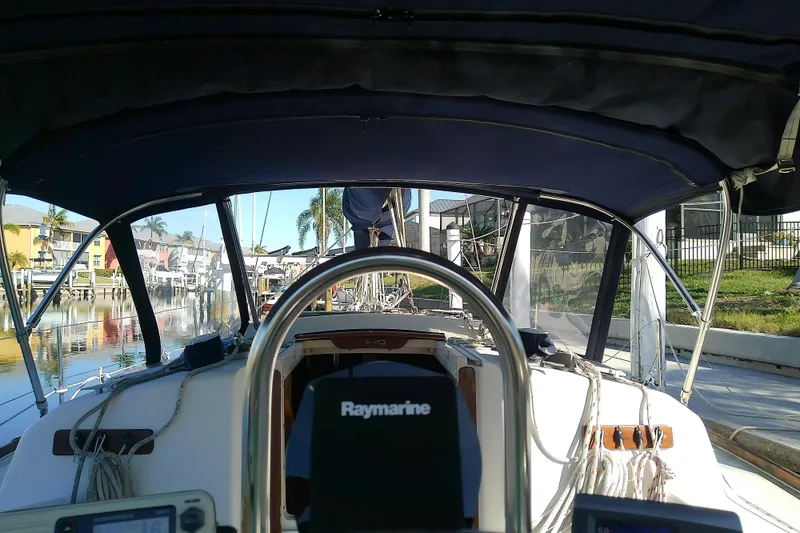 Slide: The Image of Cockpit view of a 1988 Pearson 36-2 sailboat with Raymarine equipment. - 17