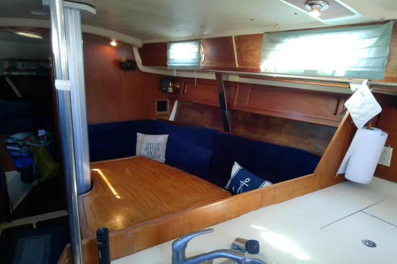 Slide: The Image of Interior of 1988 Pearson 36-2 sailboat with cozy seating and nautical decor. - 31
