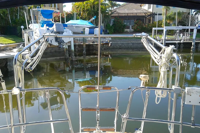 Slide: The Image of Sailboat docked in marina, Pearson 36-2, 1988 model, with polished railings and calm water. - 7