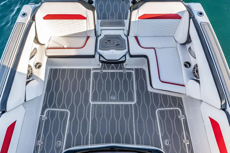 Slide: The Image of 2022 Sunsation 32 CCX with Mercury Verado outboard engine, sunlit background. - 11