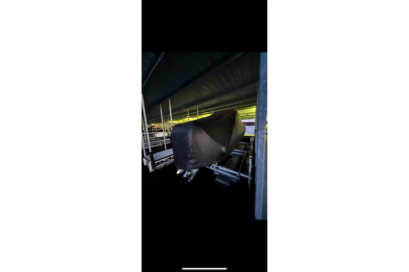 Slide: The Image of Interior cabin of 2022 Sunsation 32 CCX boat with modern seating and storage. - 20