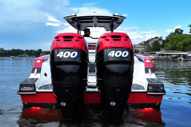 Slide: The Image of 2022 Sunsation 32 CCX dashboard with dual navigation screens and modern controls. - 4