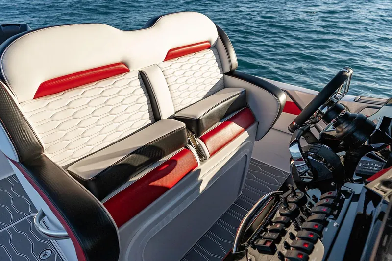 Slide: The Image of 2022 Sunsation 32 CCX boat interior with stylish seating and modern design. - 9