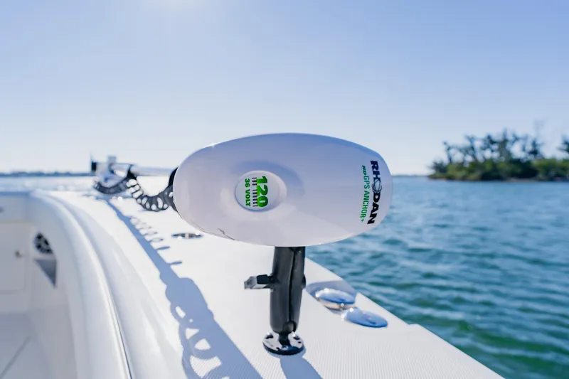 Slide: The Image of Bow storage compartment of 2025 SeaVee 370Z boat, open on calm water. - 11