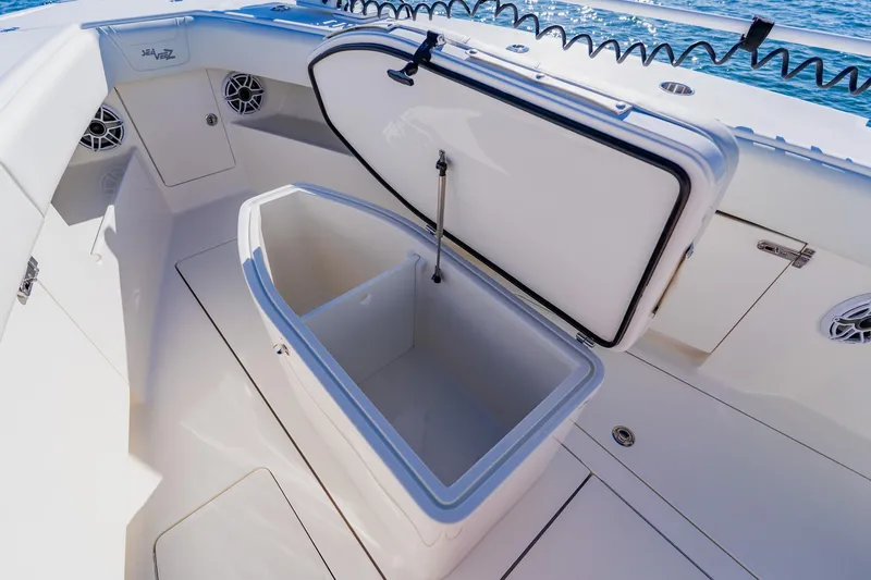 Slide: The Image of 2025 SeaVee 370Z boat on water, showcasing sleek design and spacious deck. - 15