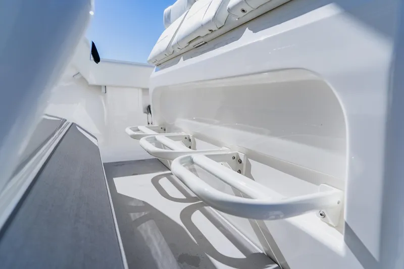 Slide: The Image of 2025 SeaVee 370Z boat deck with rod holders and speaker detail. - 23