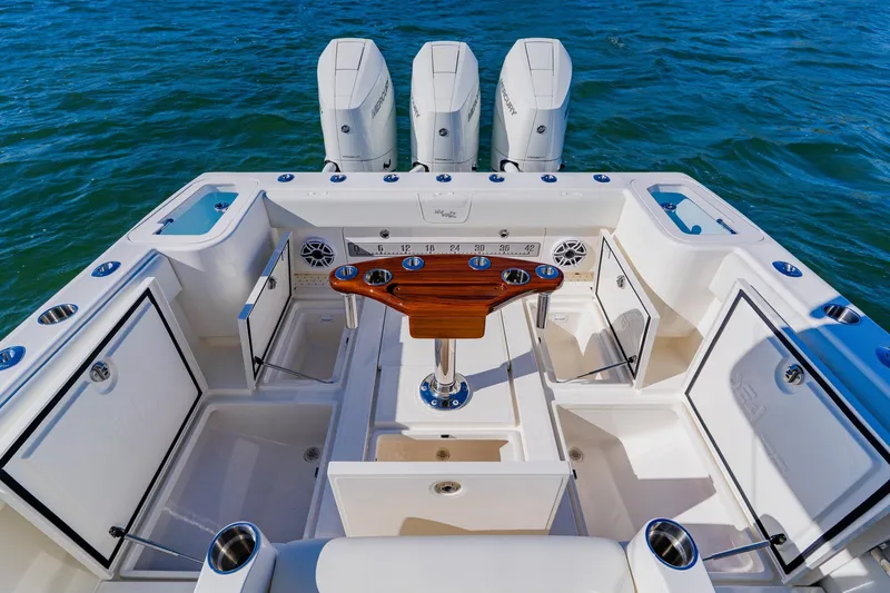 Slide: The Image of 2025 SeaVee 370Z boat storage compartments and seating area, featuring sleek design and functionality. - 27