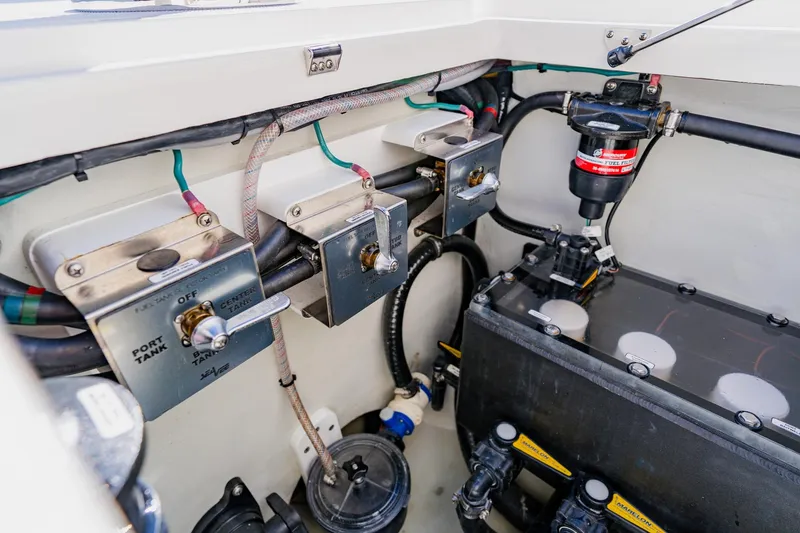 Slide: The Image of 2025 SeaVee 370Z boat on open water, featuring sleek design and spacious deck. - 37