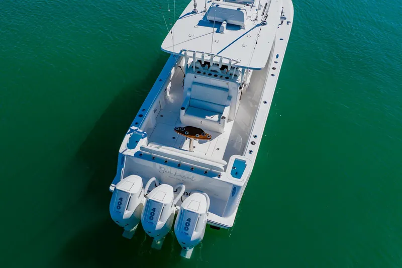 Slide: The Image of 2025 SeaVee 370Z boat on clear green water, aerial view. - 4