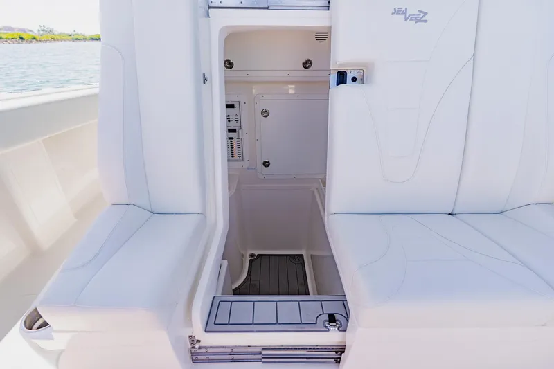 Slide: The Image of Interior of 2025 SeaVee 370Z boat featuring control panel and sink area. - 52