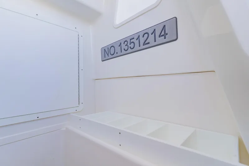 Slide: The Image of Electrical panel of 2025 SeaVee 370Z boat, showcasing wiring and components. - 54