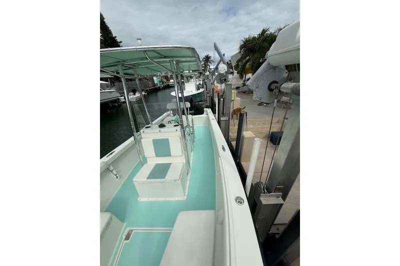 Slide: The Image of 2015 Albury Brothers 23 Center Console boat docked at marina. - 4