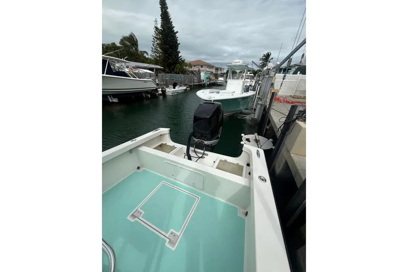 Slide: The Image of 2015 Albury Brothers 23 Center Console boat docked in a marina. - 9
