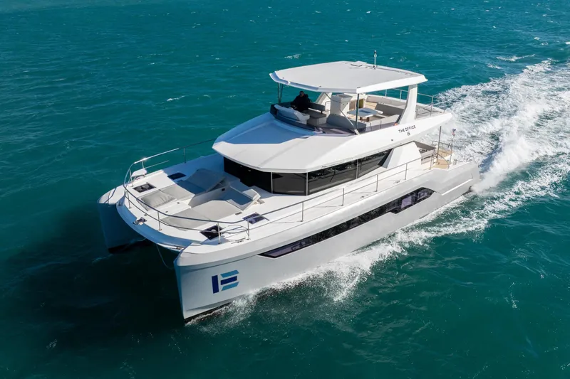 Slide: The Image of 2021 Leopard 53 Powercat cruising on open water, showcasing sleek design and luxury features. - 1