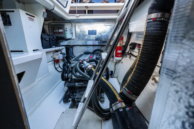 Slide: The Image of Engine room of 2021 Leopard 53 Powercat with visible machinery and equipment. - 18