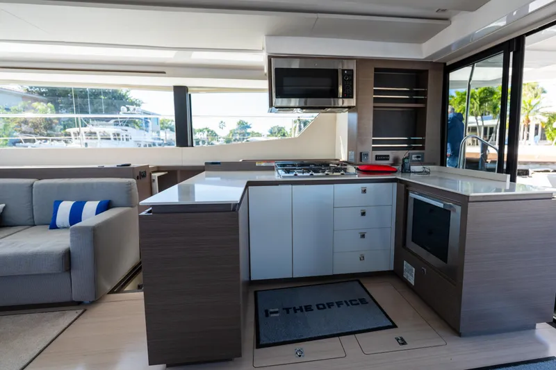 Slide: The Image of Modern kitchen interior on 2021 Leopard 53 Powercat yacht, featuring sleek design and appliances. - 21