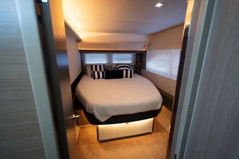 Slide: The Image of Luxurious bedroom interior of 2021 Leopard 53 Powercat yacht with cozy bedding. - 28