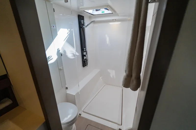 Slide: The Image of Modern bathroom in 2021 Leopard 53 Powercat yacht, featuring shower and toilet. - 34