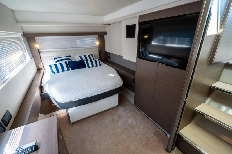 Slide: The Image of Luxurious bedroom interior of 2021 Leopard 53 Powercat yacht with modern design and cozy bedding. - 38