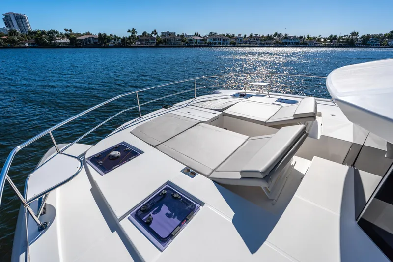 Slide: The Image of Luxurious 2021 Leopard 53 Powercat yacht with spacious deck and scenic waterfront view. - 43