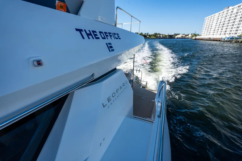 Slide: The Image of 2021 Leopard 53 Powercat cruising on water, view from the side deck. - 46