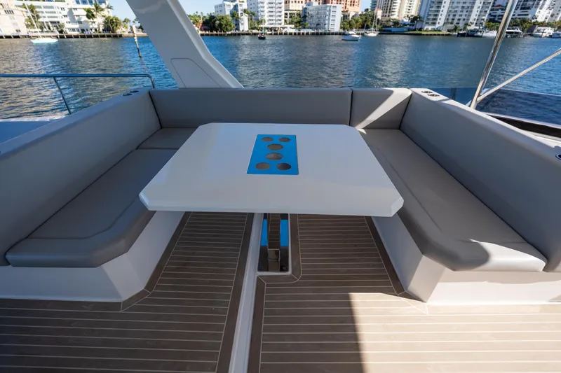 Slide: The Image of Luxurious seating area on 2021 Leopard 53 Powercat yacht with waterfront view. - 49