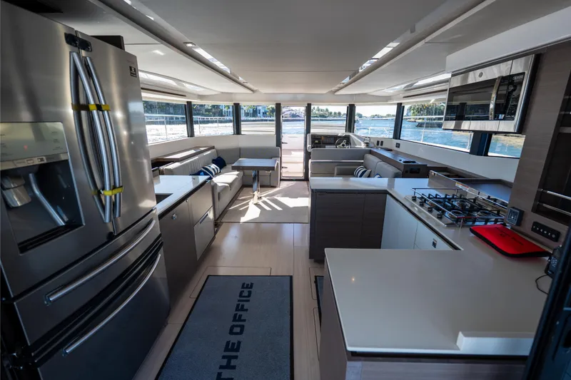 Slide: The Image of Luxurious interior of 2021 Leopard 53 Powercat yacht with modern kitchen and spacious seating. - 51