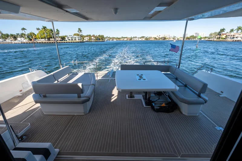 Slide: The Image of Spacious deck of 2021 Leopard 53 Powercat yacht with seating and ocean view. - 55