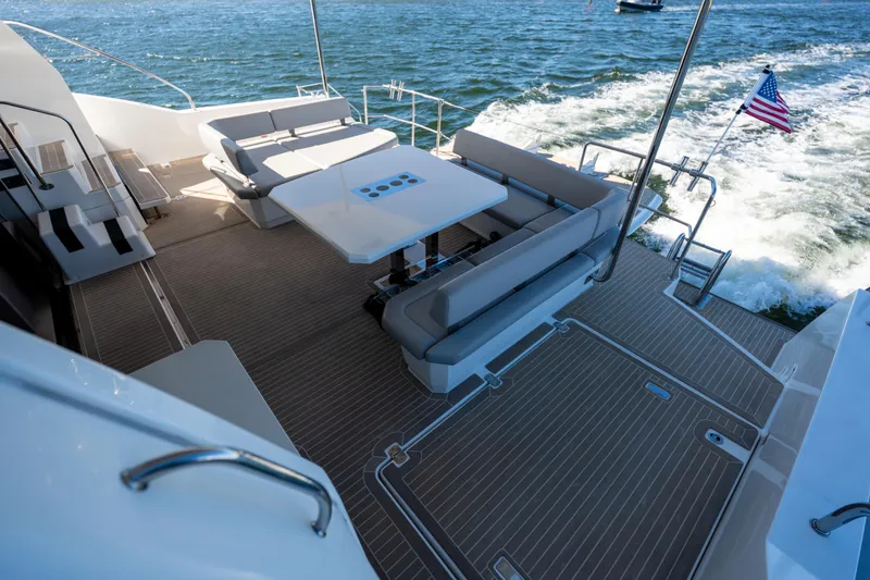 Slide: The Image of Spacious deck of 2021 Leopard 53 Powercat yacht with seating and ocean view. - 56