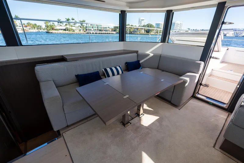 Slide: The Image of Interior of 2021 Leopard 53 Powercat with modern seating and ocean view. - 58