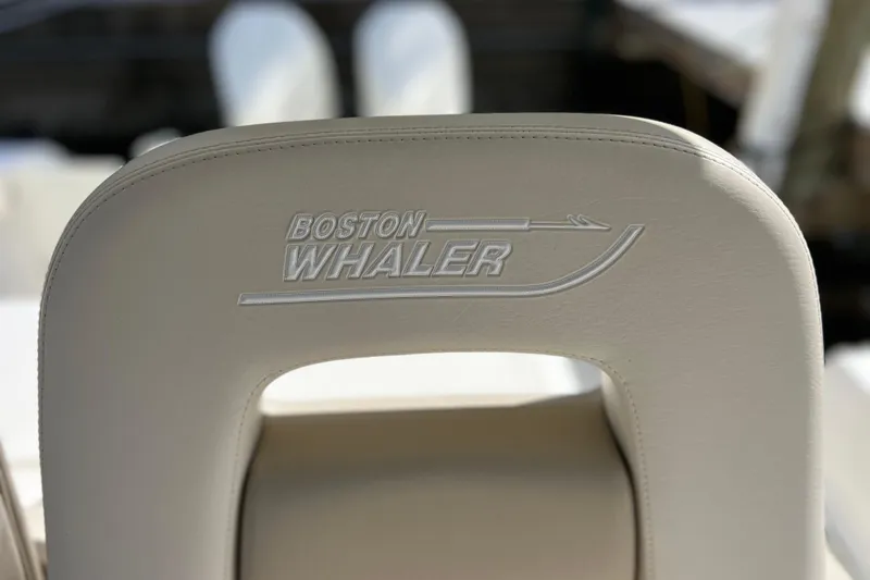 Slide: The Image of Boston Whaler 330 Outrage 2021 boat seat with embroidered logo. - 34