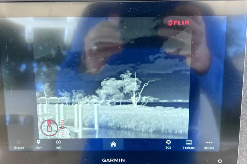 Slide: The Image of FLIR thermal imaging display on 2021 Boston Whaler 330 Outrage boat, showing landscape view. - 46