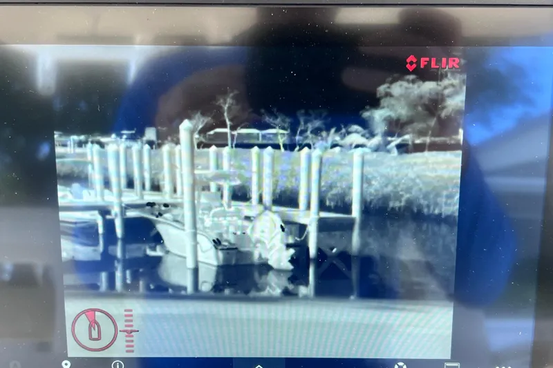 Slide: The Image of Thermal image of a 2021 Boston Whaler 330 Outrage docked at a marina. - 47