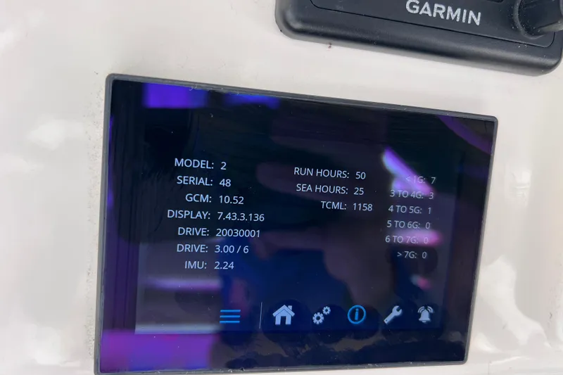 Slide: The Image of Display screen on 2021 Boston Whaler 330 Outrage showing technical data and settings. - 75