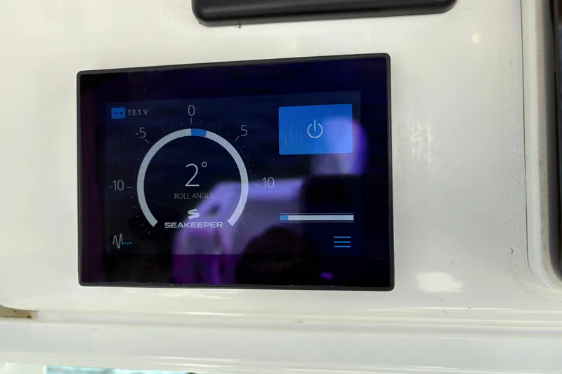 Slide: The Image of Seakeeper control panel on 2021 Boston Whaler 330 Outrage displaying roll angle. - 77