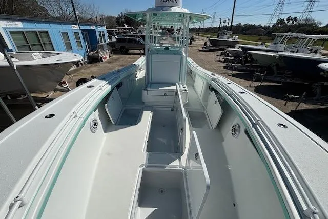 Slide: The Image of 2024 Yellowfin 36 Offshore boat interior, showcasing spacious deck and storage compartments. - 20