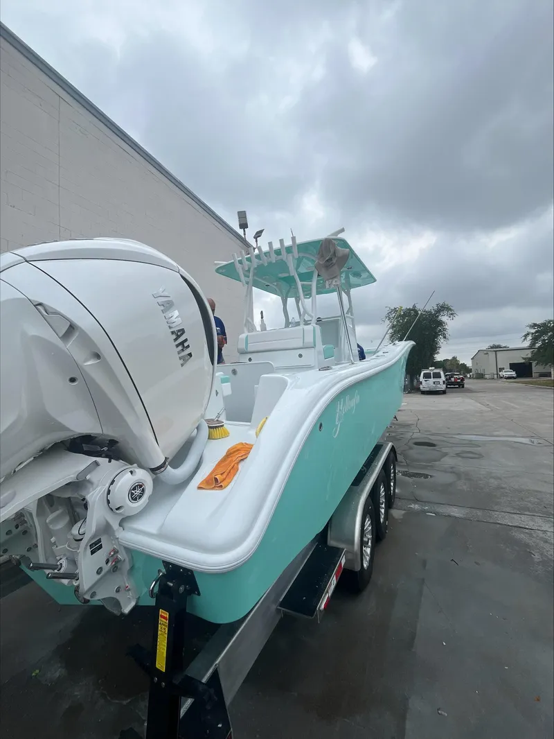 Slide: The Image of 2024 Yellowfin 36 Offshore boat with Yamaha engine on trailer. - 3