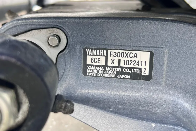 Slide: The Image of Yamaha F300XCA engine label on 2015 Pathfinder 2600 HPS, made in Japan. - 13
