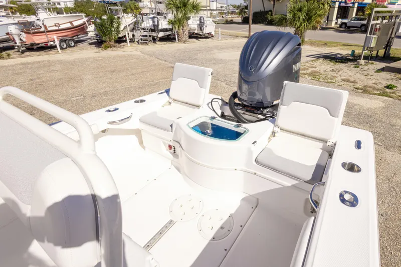 Slide: The Image of 2016 Everglades 243 Center Console boat with Yamaha engine, featuring spacious seating and modern design. - 12