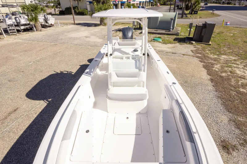 Slide: The Image of 2016 Everglades 243 Center Console boat interior with steering wheel and control panel. - 16