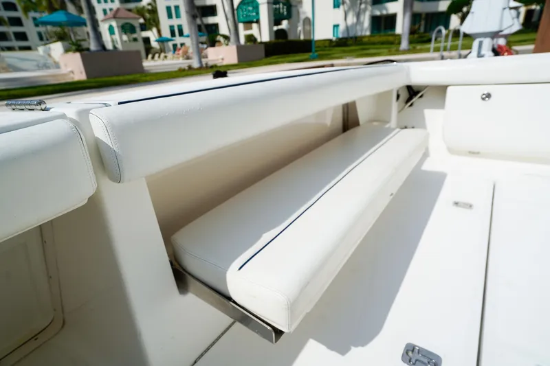 Slide: The Image of 2005 Tiara Yachts 3800 Open boat interior with white seating and modern design. - 14