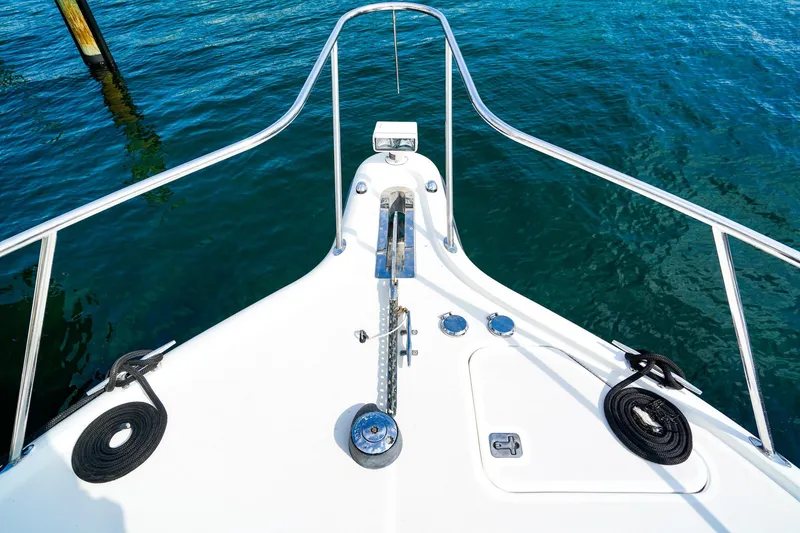 Slide: The Image of Bow view of 2005 Tiara Yachts 3800 Open on clear blue water. - 40