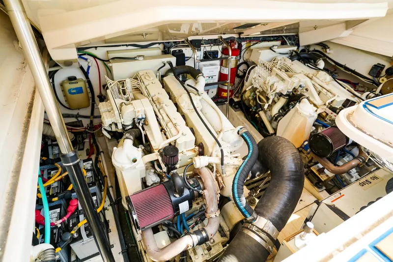 Slide: The Image of Engine room of 2005 Tiara Yachts 3800 Open, showcasing dual engines and equipment. - 45